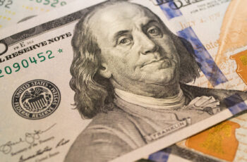 image of a 100 dollar bill and benjamin Franklin